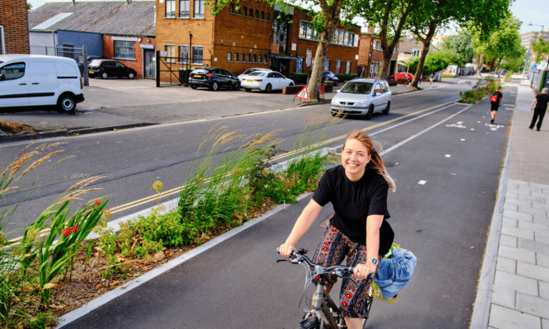 Women cycling on segregated cycle lane on Whitehouse st bristol