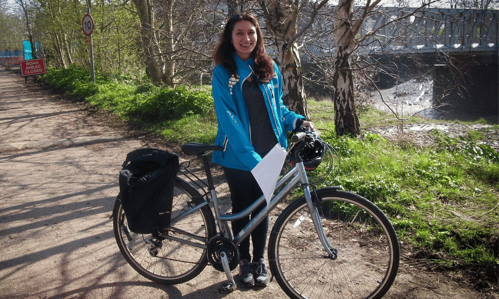 Young lady borrowing a loan bike