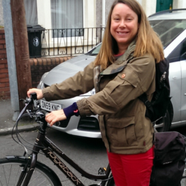 Young lady borrowing a loan bike