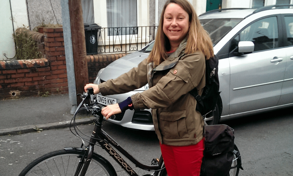 Young lady borrowing a loan bike