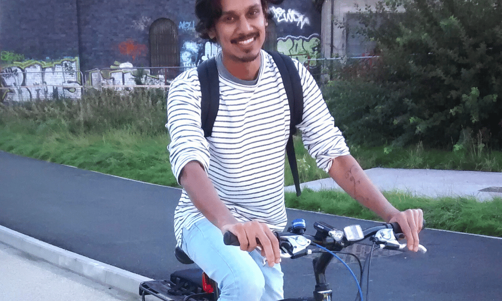 Young man borrowing a loan bike