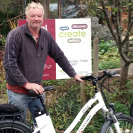 Man borrowing an electric bike