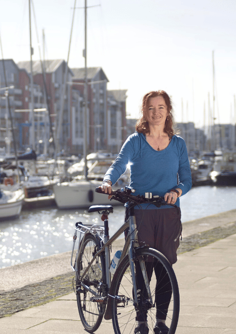 Rachel cycling in Portishead marina