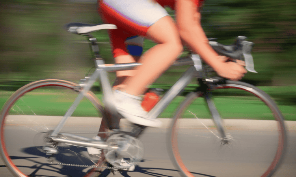 Blurred image of fast cyclists racing